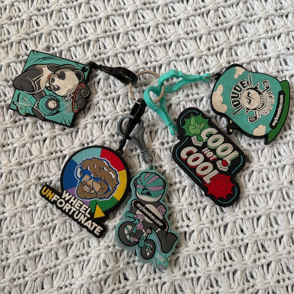 Dude Perfect Keychains Set Of 4 Multicolor Trigger Clip